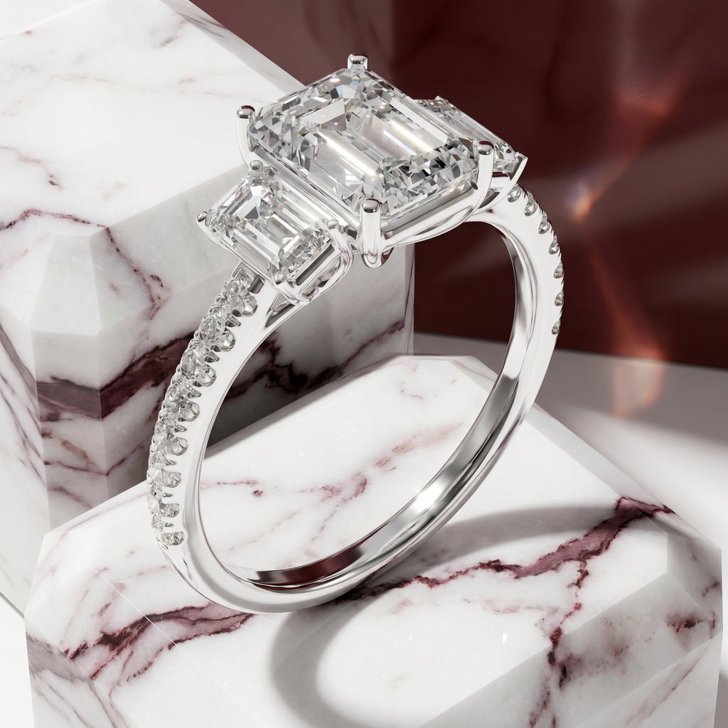 Vivienne Emerald Cut Three Stone Engagement Ring