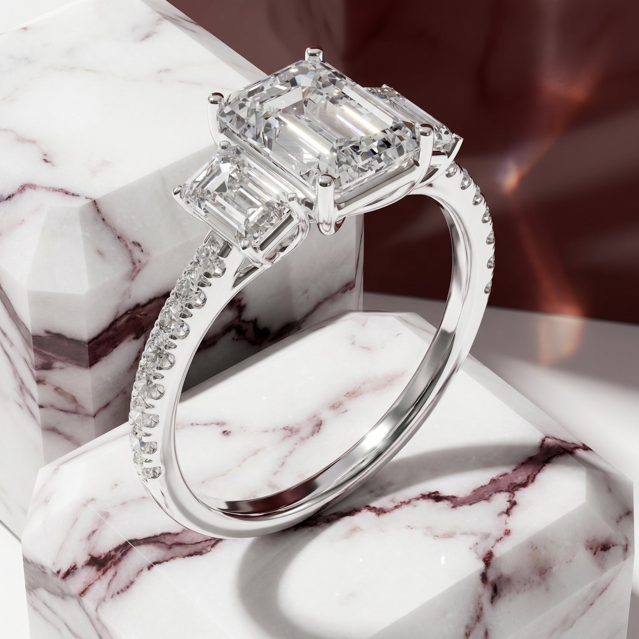 Vivienne Emerald Cut Three Stone Engagement Ring