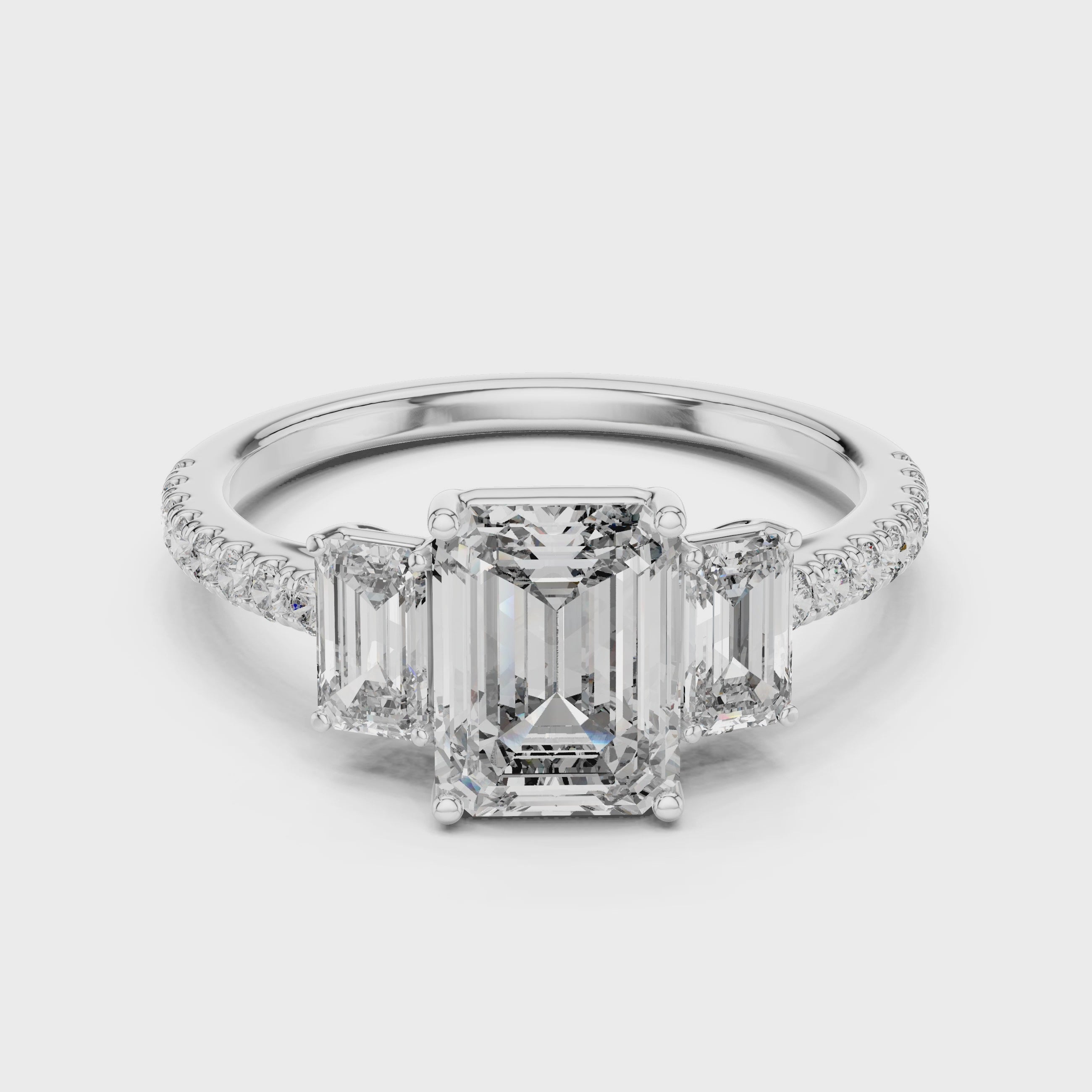 Vivienne Emerald Cut Three Stone Engagement Ring