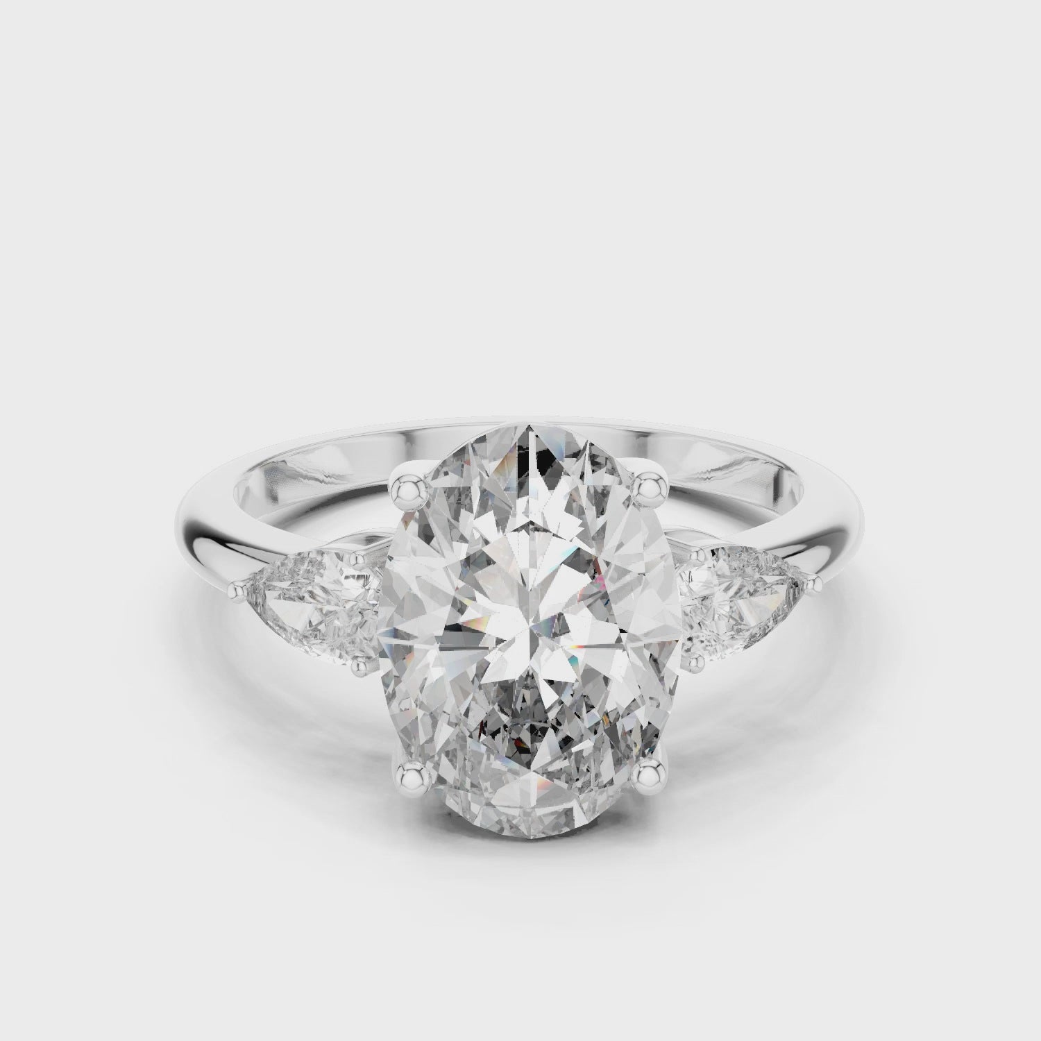 Aurora Oval Three-Stone Moissanite Ring